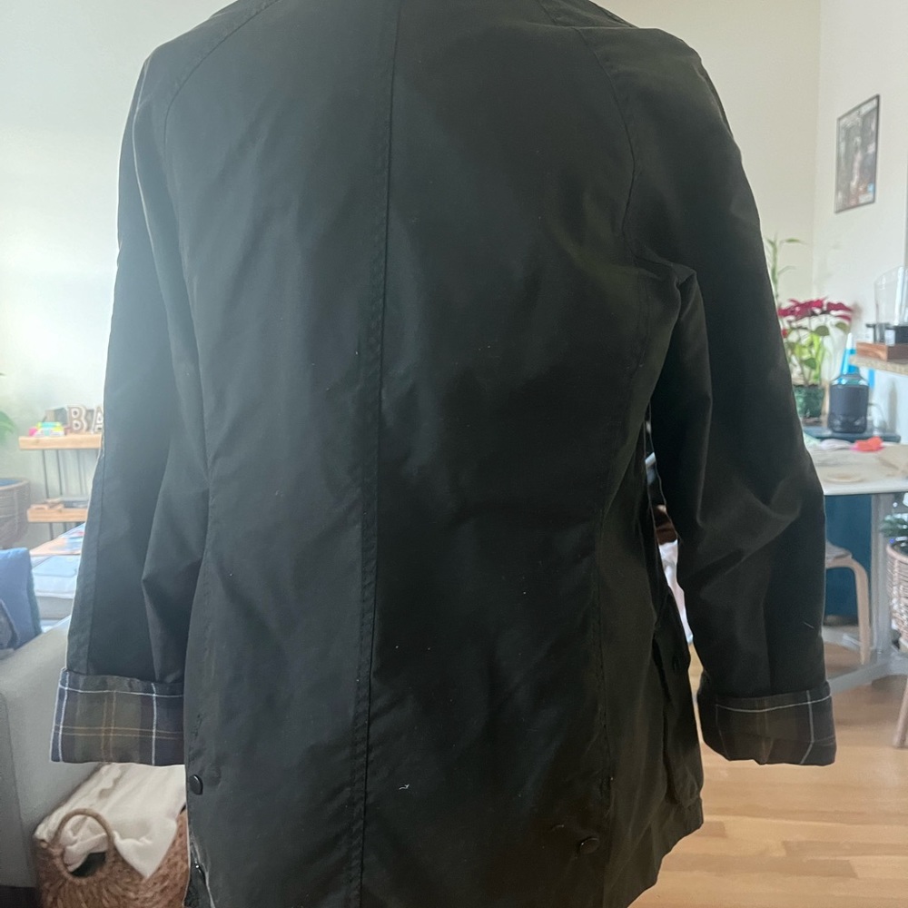 Barely worn Barbour jacket.  Excellent quality!
